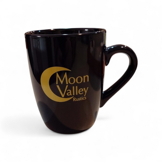 Black mug with 'Moon Valley Rustics' logo on a white background